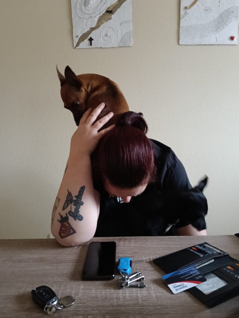 Miniature Pinscher, Tiny shows whos's the boss and climbs on owner's neck 